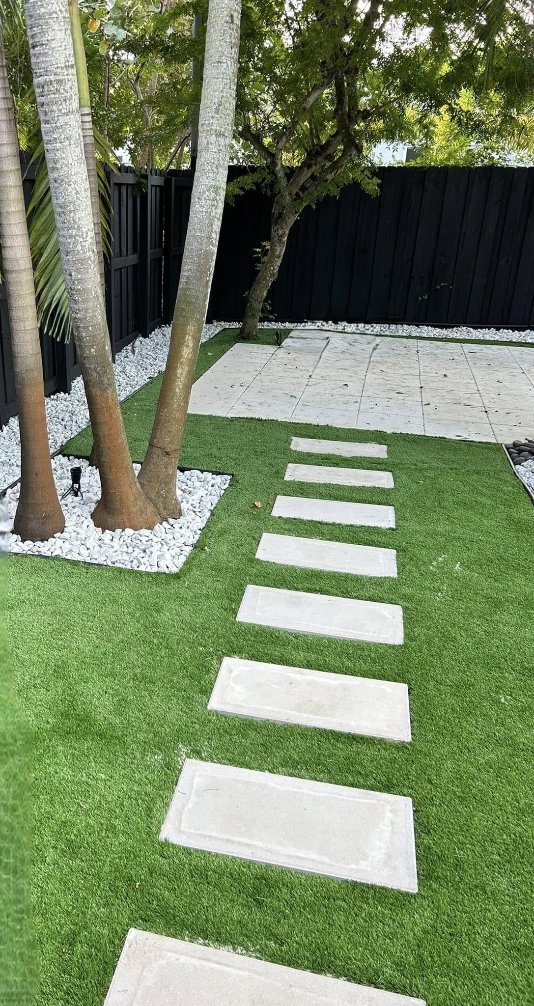 Completed backyard turf and stepping stone project